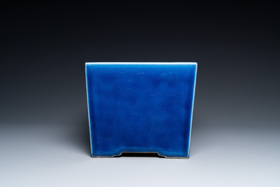 A Chinese rectangular blue-glazed jardini&egrave;re on wooden stand, 19th C.