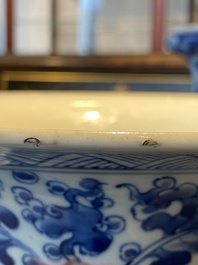 A Chinese blue, white and copper-red 'gu' vase with lotus scrolls, Kangxi