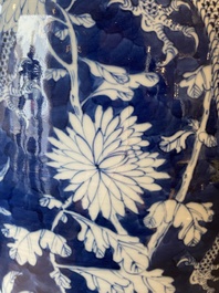 A pair of Chinese blue and white 'dragon and peony' vases, 19th C.