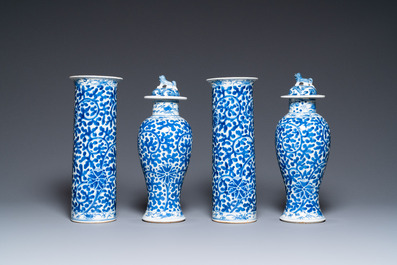 A Chinese blue and white four-piece garniture, Kangxi mark, 19th C.