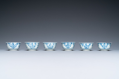 Six Chinese blue and white cups and saucers, six famille rose cups and five saucers, Kangxi/Qianlong