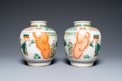 A pair of Chinese famille verte vases on wooden stands, 'hare' mark, 19th C.