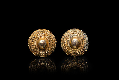 Three Vietnamese golden earrings, Champa, 14th C. and a pair of later Chinese gilded earrings, 18/19th C.