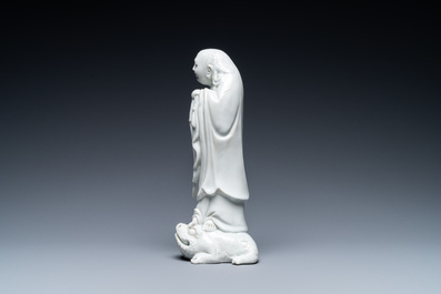 A Chinese Dehua blanc de Chine figure of Liu Hai with the toad, Kangxi