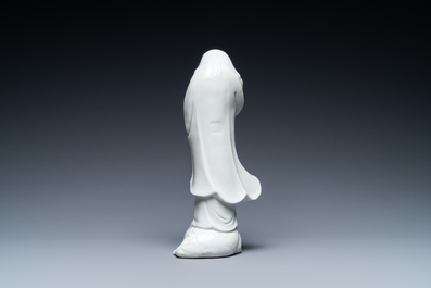 A Chinese Dehua blanc de Chine figure of Liu Hai with the toad, Kangxi