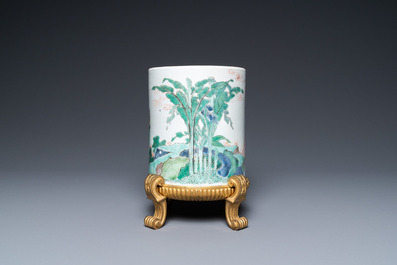 A Chinese famille verte brush pot on gilt bronze stand, Kangxi