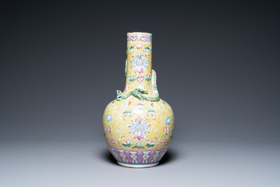 A Chinese yellow-ground famille rose bottle vase, 19th C.