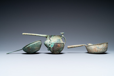 Two Luristan bronze pouring bowls and a spouted vessel, Iran, 1st millenium BC