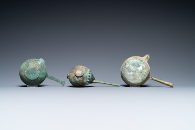 Two Luristan bronze pouring bowls and a spouted vessel, Iran, 1st millenium BC
