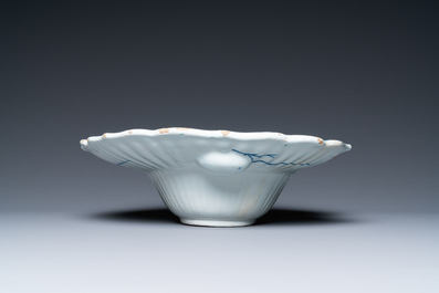 A gadrooned Dutch Delft blue and white shaving bowl, 18th C.