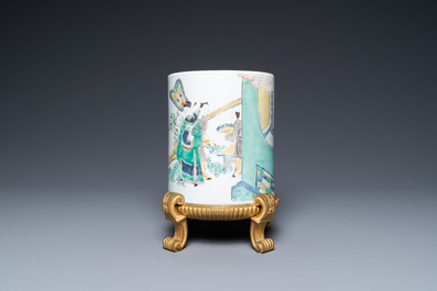 A Chinese famille verte brush pot on gilt bronze stand, Kangxi