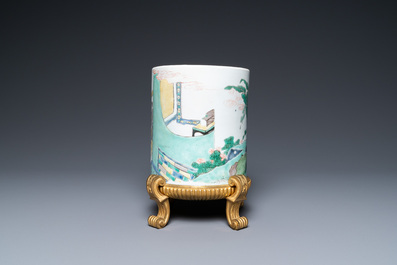 A Chinese famille verte brush pot on gilt bronze stand, Kangxi