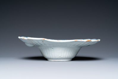 A gadrooned Dutch Delft blue and white shaving bowl, 18th C.