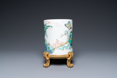 A Chinese famille verte brush pot on gilt bronze stand, Kangxi