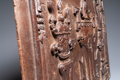 A Chinese carved wooden 'antiquities' panel, 19th C.