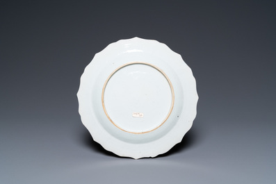 A Chinese famille rose 'mandarin tea drinkers' plate, Qianlong