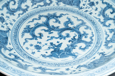An impressive large Chinese blue and white 'dragon' dish, Ming, 2nd half 15th C.