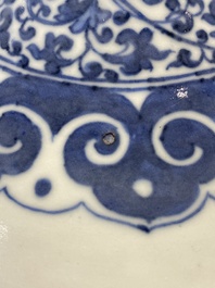 A Chinese blue, white and copper-red bottle vase with a deer and birds among blossoming branches, Daoguang
