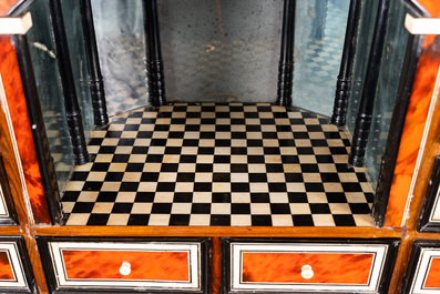 A tortoise veneer, gilt copper, ebony and ebonised wooden mirrored interior cabinet on stand, Antwerp, 17th C.