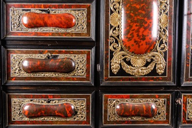 A tortoise veneer, gilt copper, ebony and ebonised wooden mirrored interior cabinet on stand, Antwerp, 17th C.