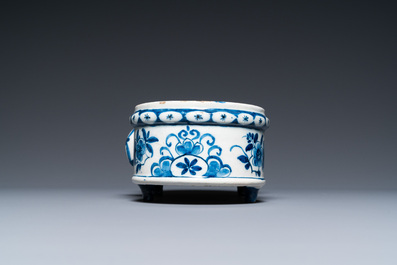 A Dutch Delft blue and white cruet set on stand, 18th C.