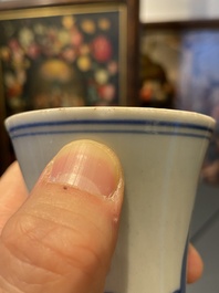 A Chinese blue and white bottle vase depicting four figures, Transitional period