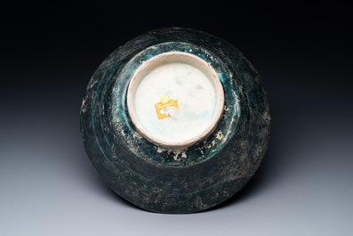 A turquoise- and black-glazed bowl, Kashan, Iran, 12/13th C.