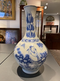 A Chinese blue and white bottle vase depicting four figures, Transitional period