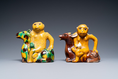 Two Chinese sancai-glazed 'monkey on deer' ewers, 19th C.
