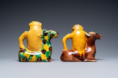 Two Chinese sancai-glazed 'monkey on deer' ewers, 19th C.