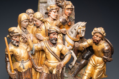 A polychromed walnut wood retable fragment depicting soldiers, Spain, 1st half 16th C.