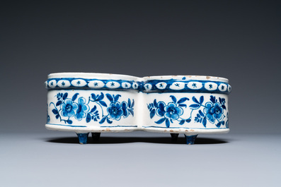 A Dutch Delft blue and white cruet set on stand, 18th C.