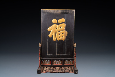 A large Chinese porcelain-embellished lacquered wooden screen, 18/19th C.