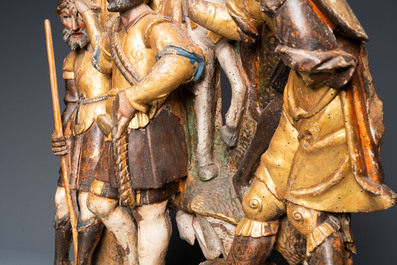 A polychromed walnut wood retable fragment depicting soldiers, Spain, 1st half 16th C.