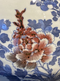 A Chinese blue, white and copper-red bottle vase with a deer and birds among blossoming branches, Daoguang