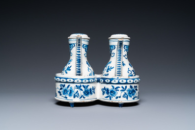 A Dutch Delft blue and white cruet set on stand, 18th C.