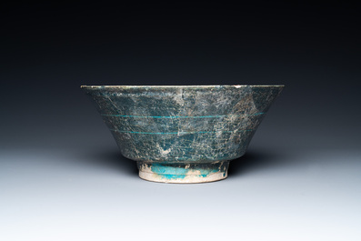 A turquoise- and black-glazed bowl, Kashan, Iran, 12/13th C.