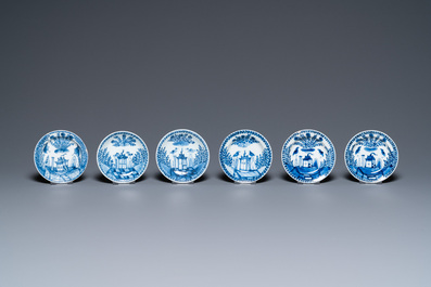 Twenty-seven Chinese blue and white saucers and seven cups, Kangxi and later
