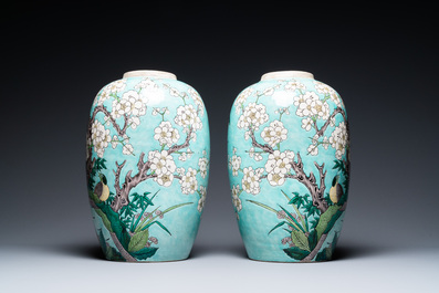 A pair of Chinese verte biscuit turquoise-ground jars, 19th C.