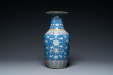 A Chinese famille rose blue-ground 'bajixiang' vase, 19th C.
