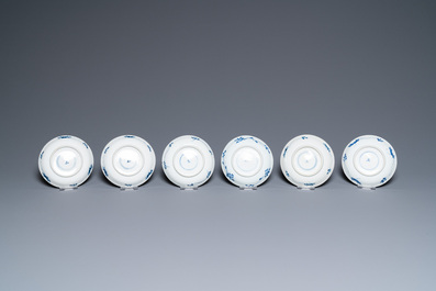 Twenty-seven Chinese blue and white saucers and seven cups, Kangxi and later