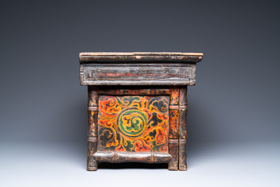 A Tibetan painted and lacquered wooden altar stand, 18th C.