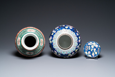 A Chinese famille verte 'mythical animals' vase and a famille rose jar and cover with dragons, 19/20th C.