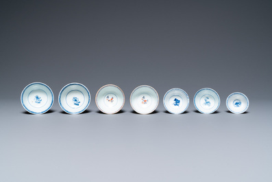 Twenty-seven Chinese blue and white saucers and seven cups, Kangxi and later