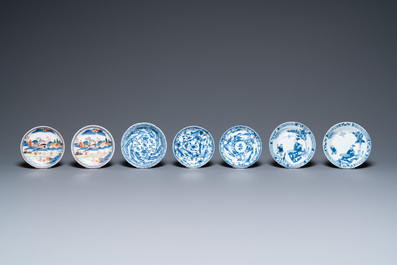 Twenty-seven Chinese blue and white saucers and seven cups, Kangxi and later