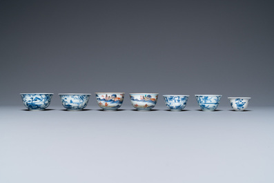 Twenty-seven Chinese blue and white saucers and seven cups, Kangxi and later