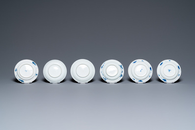 Twenty-seven Chinese blue and white saucers and seven cups, Kangxi and later