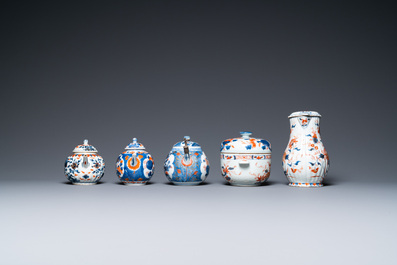 Three Chinese Imari-style teapots, a silver-mounted ewer and a covered bowl, Kangxi