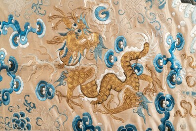 A large rectangular Chinese gold thread-embroidered silk panel decorated with four four-clawed dragons, Qing