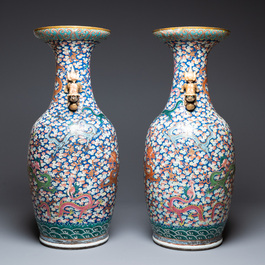 A pair of large Chinese famille rose 'dragon' vases, 19th C.